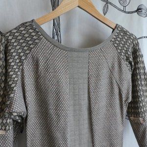 Cleverly upcycled tunic with low draped back